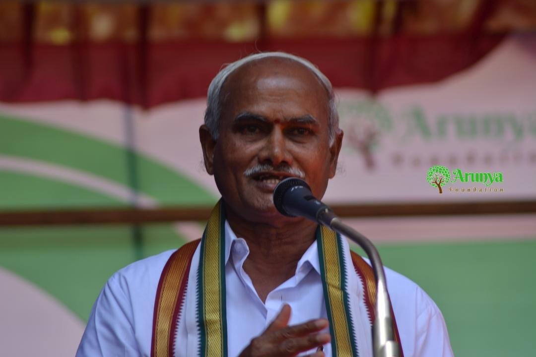 An elder farmer speaking at Krishi Sangama 2018
